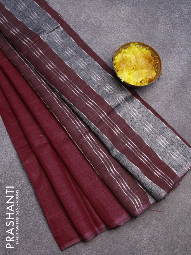 Pure linen saree maroon and rosy brown with allover zari stripe weaves and zari woven piping border