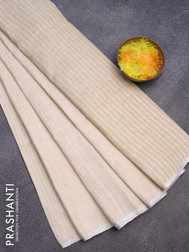 Pure linen saree cream and sandal with stripes pattern and piping border