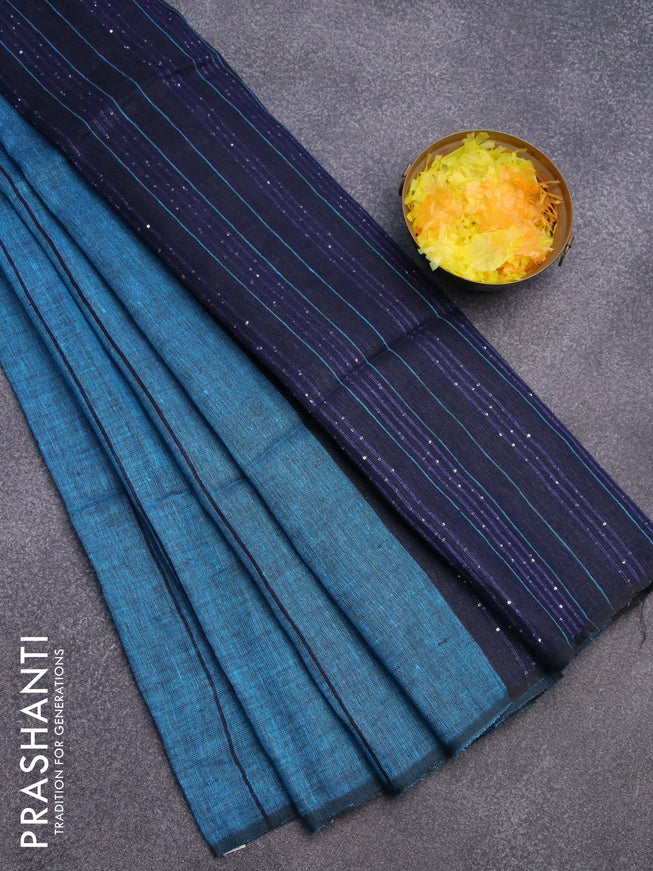 Pure linen saree cs blue and navy blue with allover stripe pattern and sequin work pallu & piping border