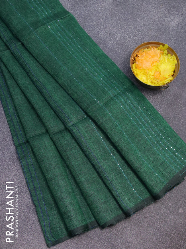 Pure linen saree green with zari stripe pattern and sequin work pallu & piping border