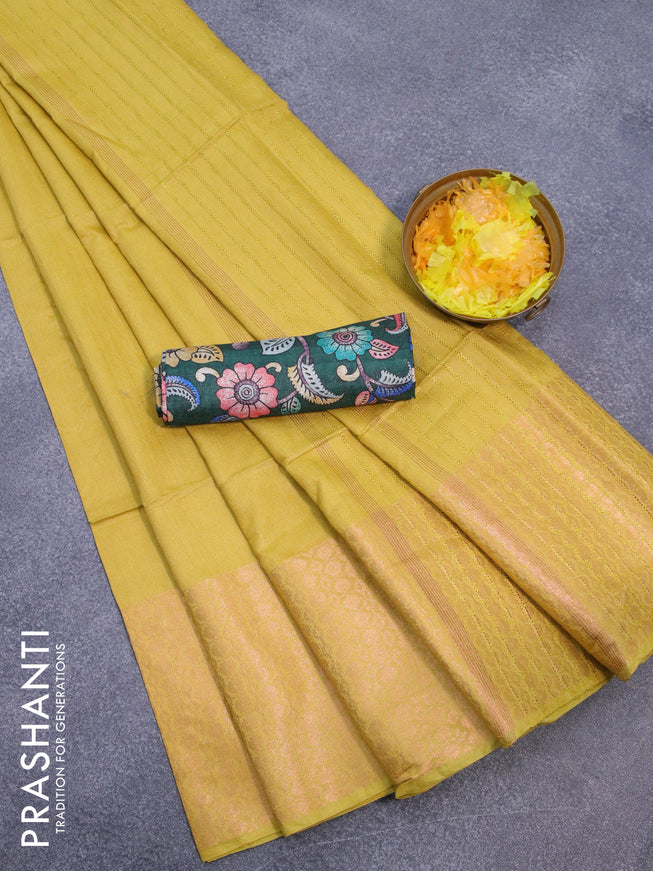 Semi tussar saree yellow and bottle green with plain body and long copper zari woven border & kalamkari printed blouse