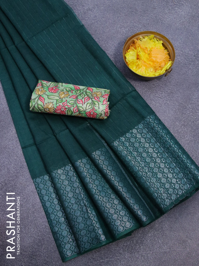 Semi tussar saree dark green and light green with plain body and long silver zari woven border & kalamkari printed blouse