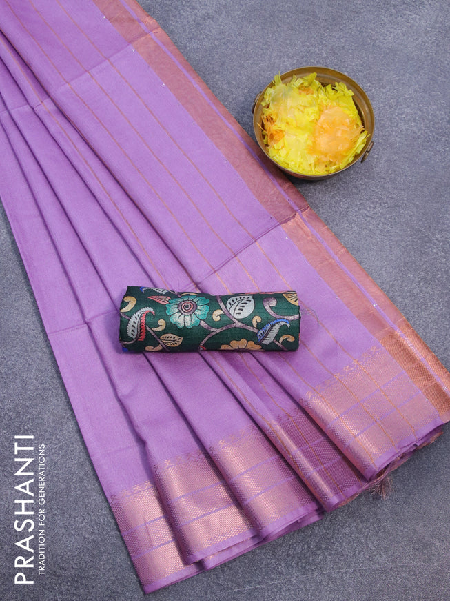 Semi tussar saree lavender shade and dark green with plain body and copper zari woven border & kalamkari printed blouse
