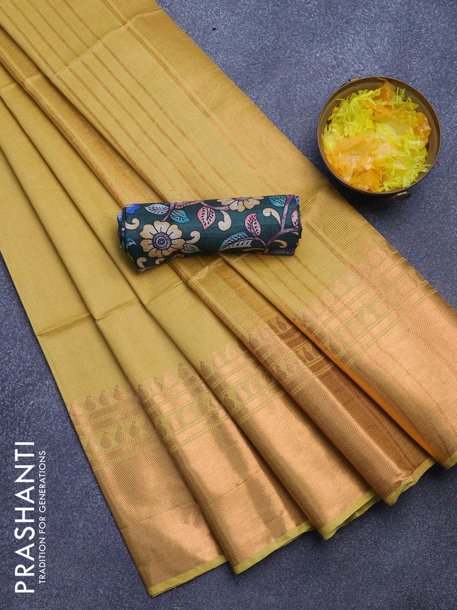 Semi tussar saree lime yellow and dark green with plain body and copper zari woven border & kalamkari printed blouse