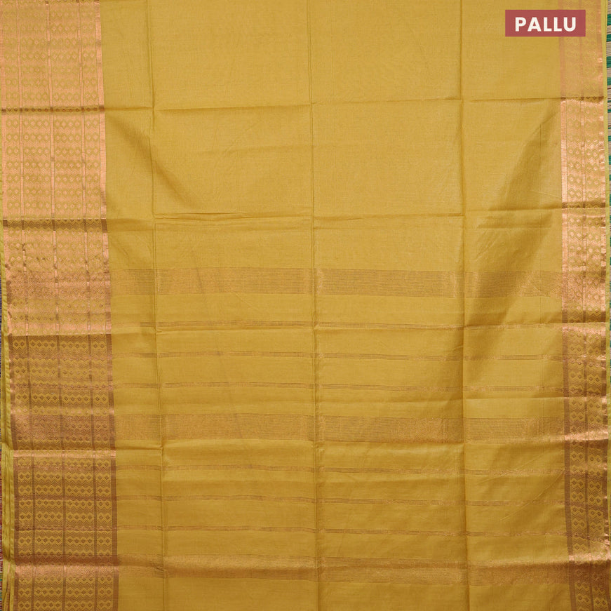 Semi tussar saree yellow and dark green with plain body and copper zari woven border & kalamkari printed blouse