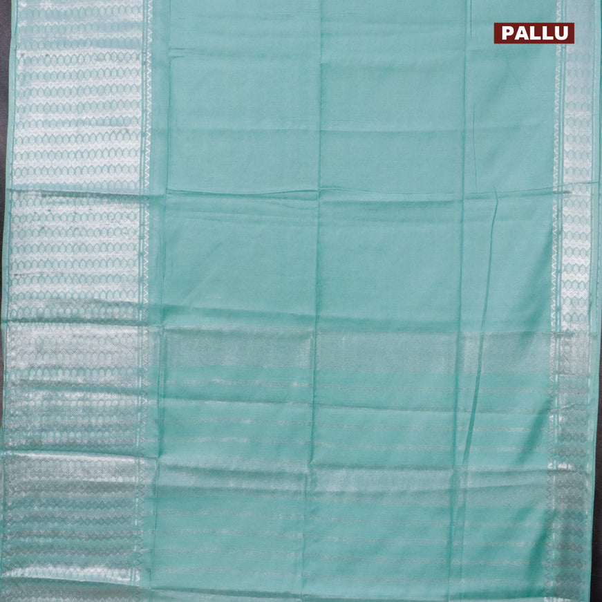 Semi tussar saree teal blue shade with plain body and silver zari woven border & kalamkari printed blouse
