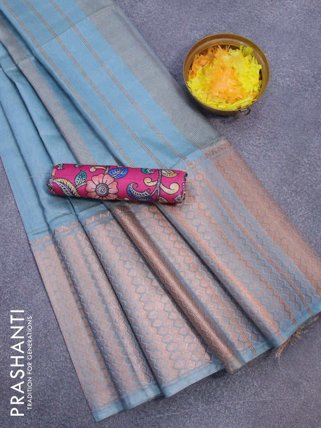 Semi tussar saree pastel blue and pink with plain body and copper zari woven border & kalamkari printed blouse