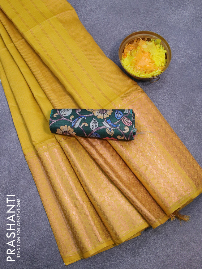 Semi tussar saree lime yellow and dark green with plain body and copper zari woven border & kalamkari printed blouse