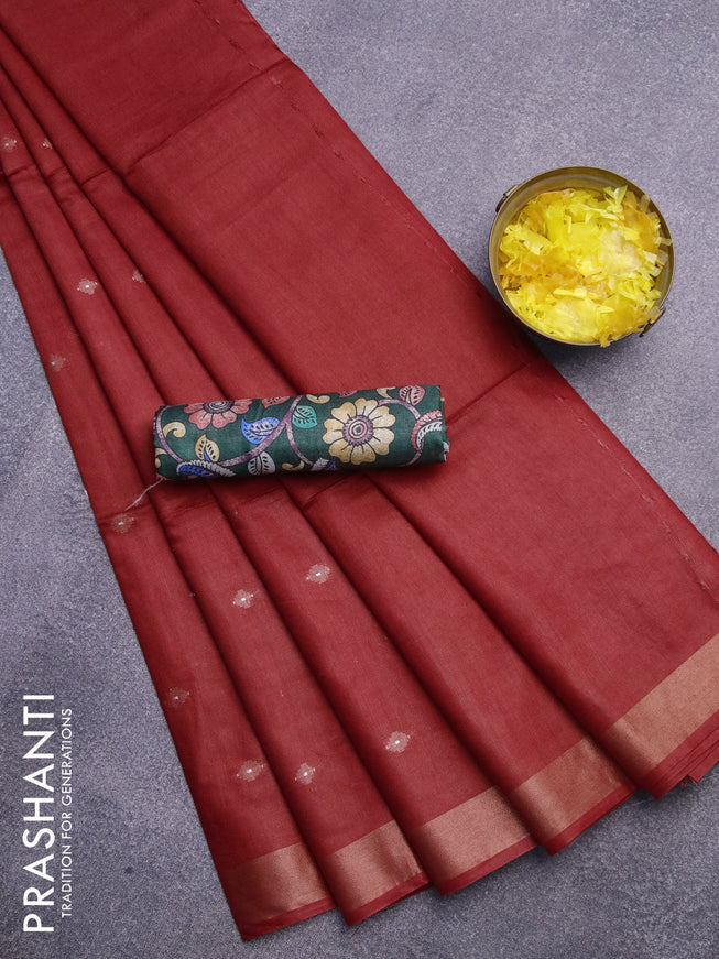 Semi tussar saree maroon shade and dark green with allover copper zari woven buttas and copper zari woven border & kalamkari printed blouse