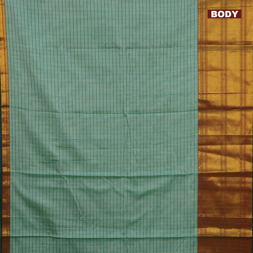 Narayanpet cotton saree green shade and dark green with allover checked pattern and long zari woven border