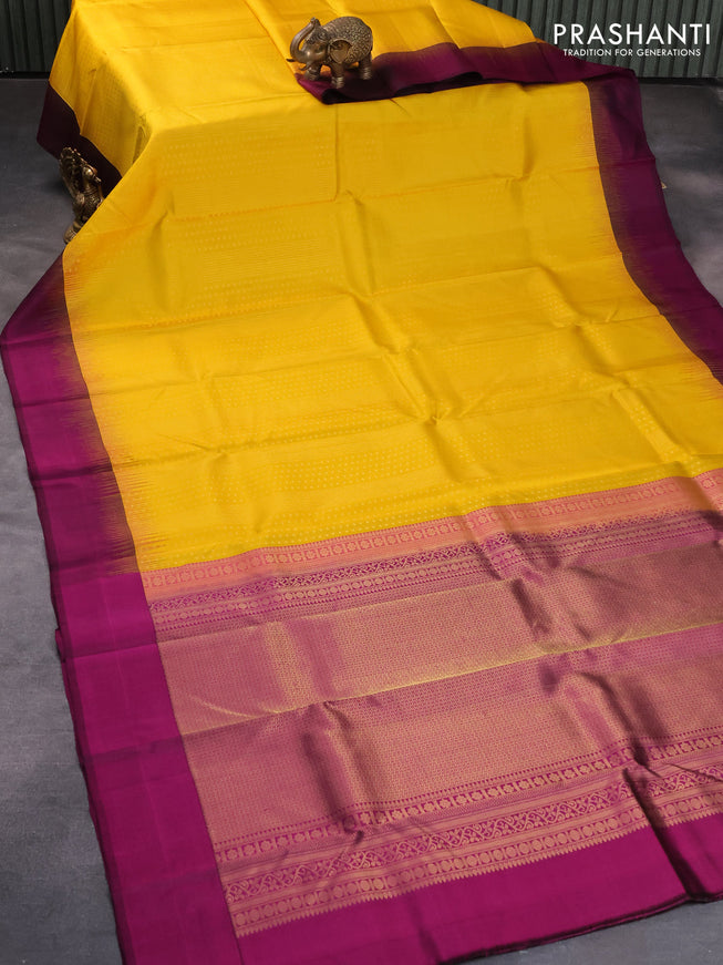 Pure kanjivaram silk saree mango yellow and magenta pink with allover zari weaves and simple border