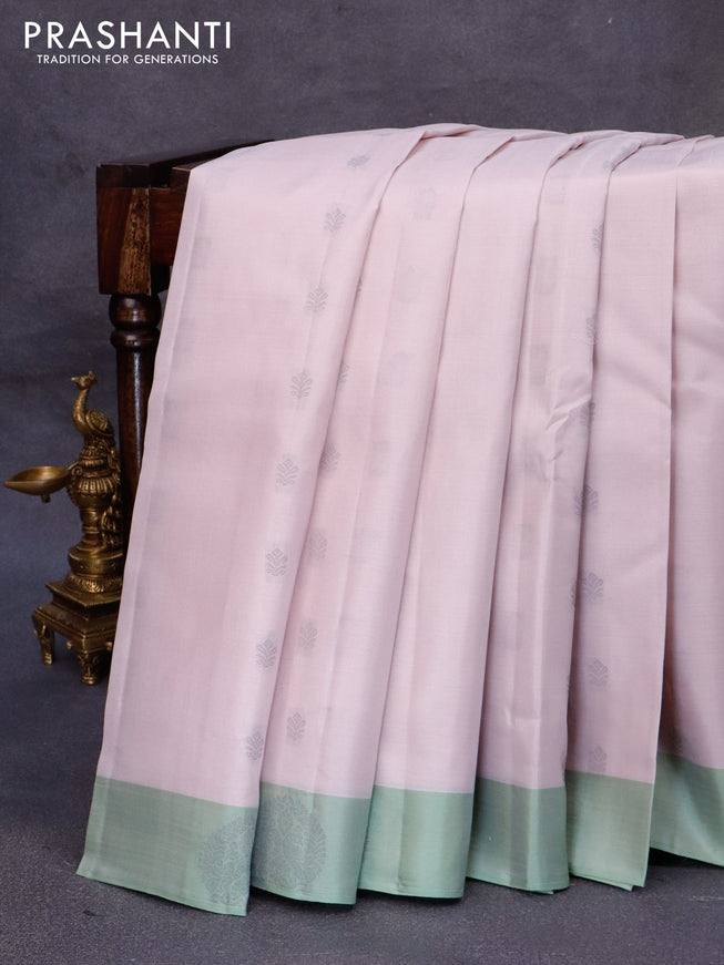 Pure kanjivaram silk saree pastel pink and pista green with thread woven buttas and zari woven butta border