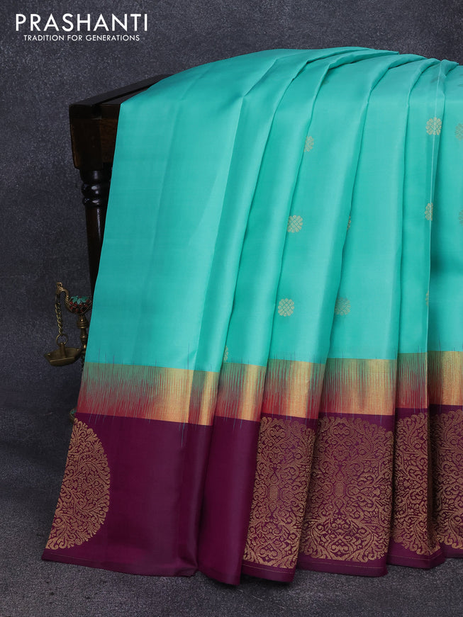 Pure kanjivaram silk saree light blue and purple with zari woven buttas and zari woven butta border