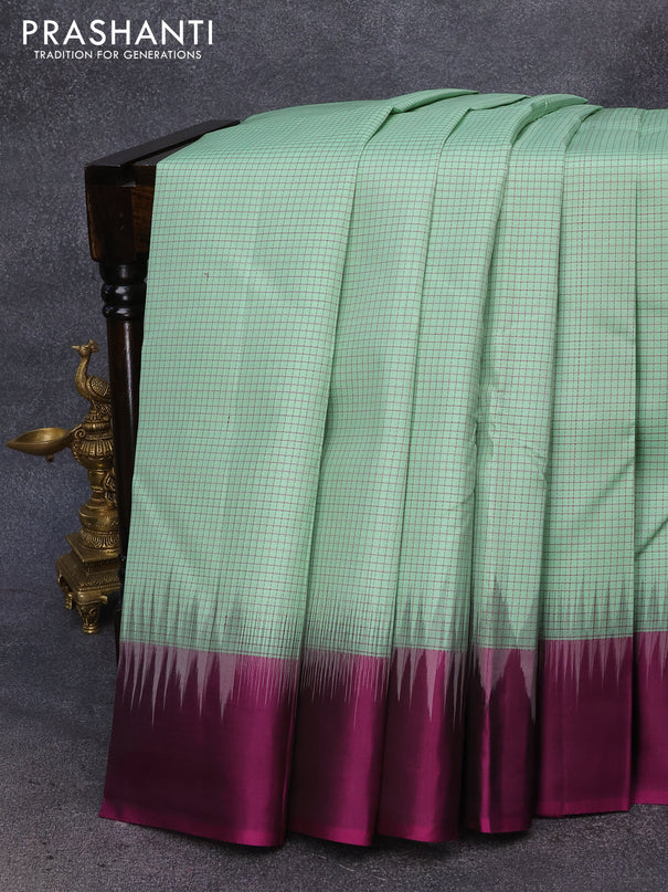Pure kanjivaram silk saree pastel green and purple with allover checked pattern and simple border