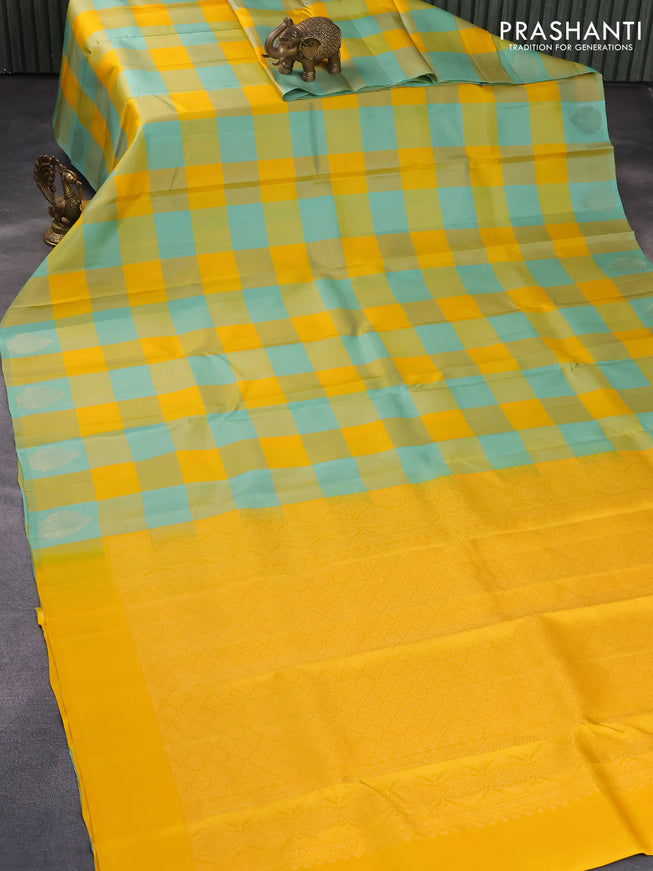 Pure kanjivaram silk saree yellow and pastel green shade with allover paalum pazhamum checks in borderless style