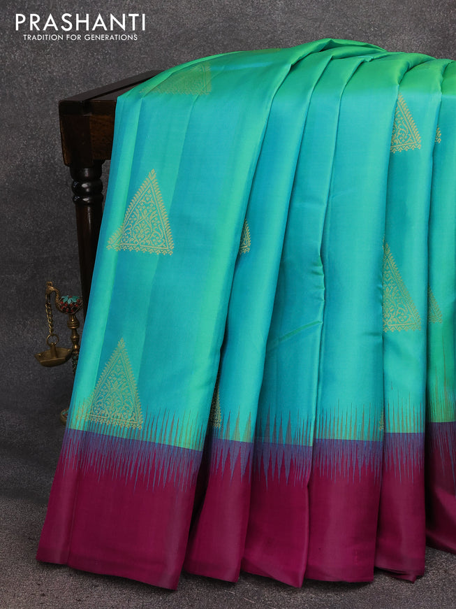 Pure kanjivaram silk saree dual shade of teal bluish green and purple with zari woven geometric buttas and simple border