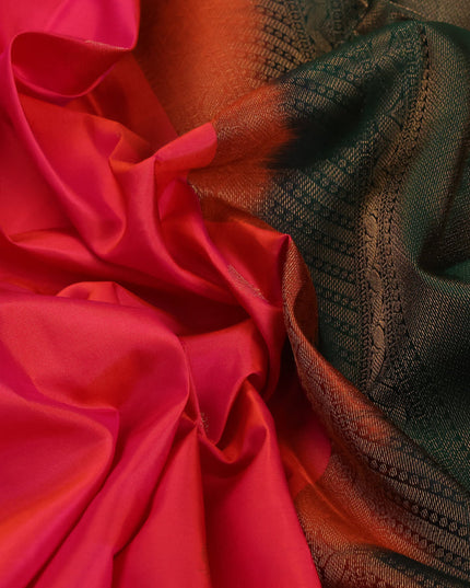 Pure kanjivaram silk saree dual shade of pinkish orange and dark green with annam zari woven buttas and zari woven border