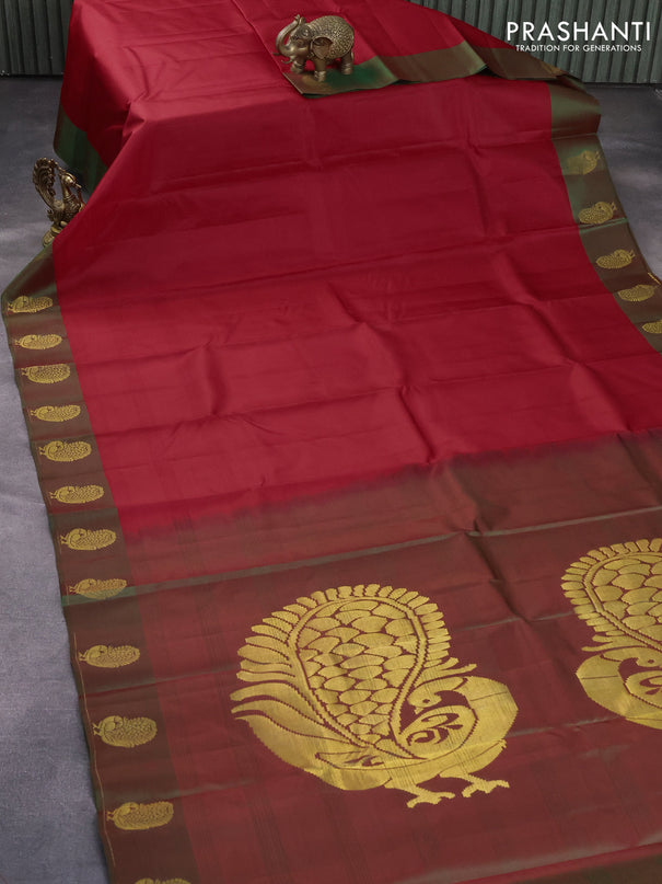 Pure kanjivaram silk saree red and dual shade of green with plain body and zari woven peacock butta border