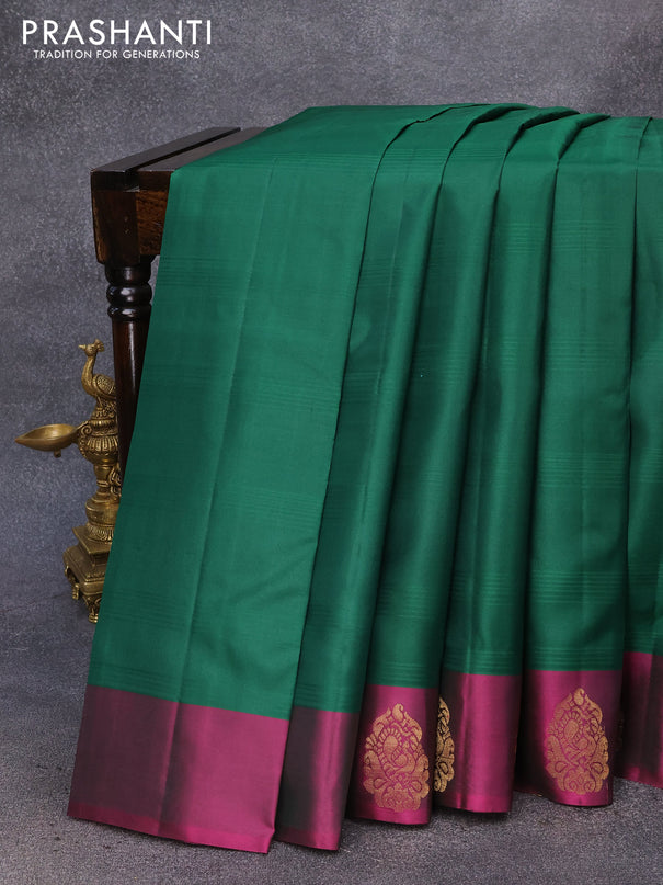 Pure kanjivaram silk saree green and magenta pink with plain body and zari woven butta border