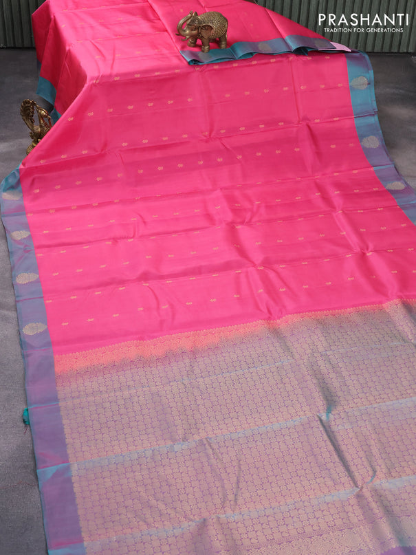 Pure kanjivaram silk saree pink and dual shade of teal green with paisley zari woven buttas and zari woven butta border