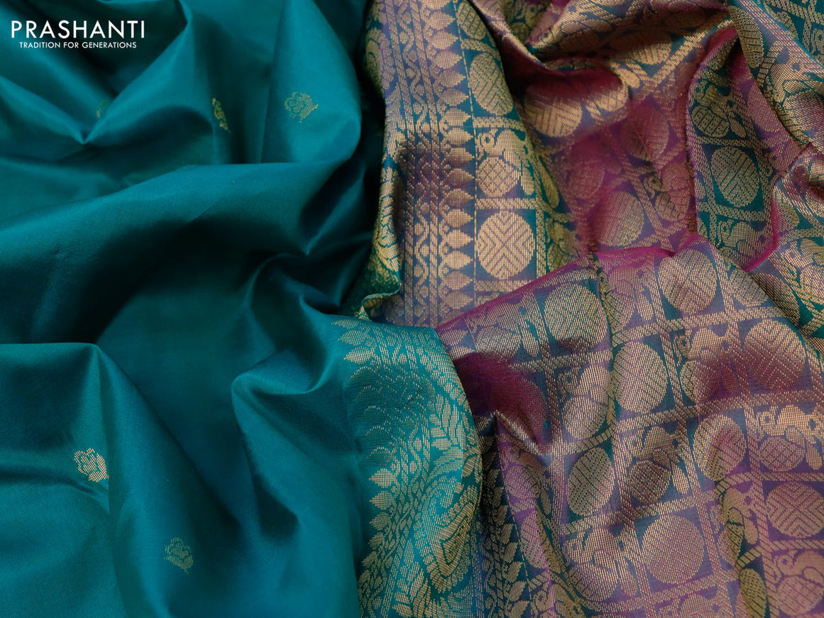 Pure kanjivaram silk saree green and dual shade of greenish pink with zari woven buttas and rettapet zari woven border