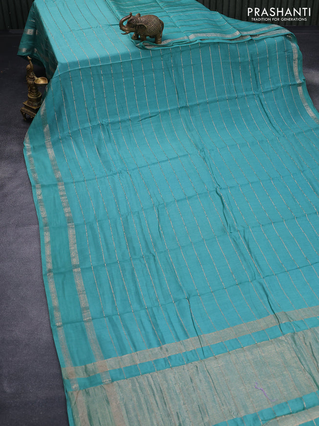 Semi chanderi saree teal blue with allover zari weaves and rettapet zari woven border - printed blouse