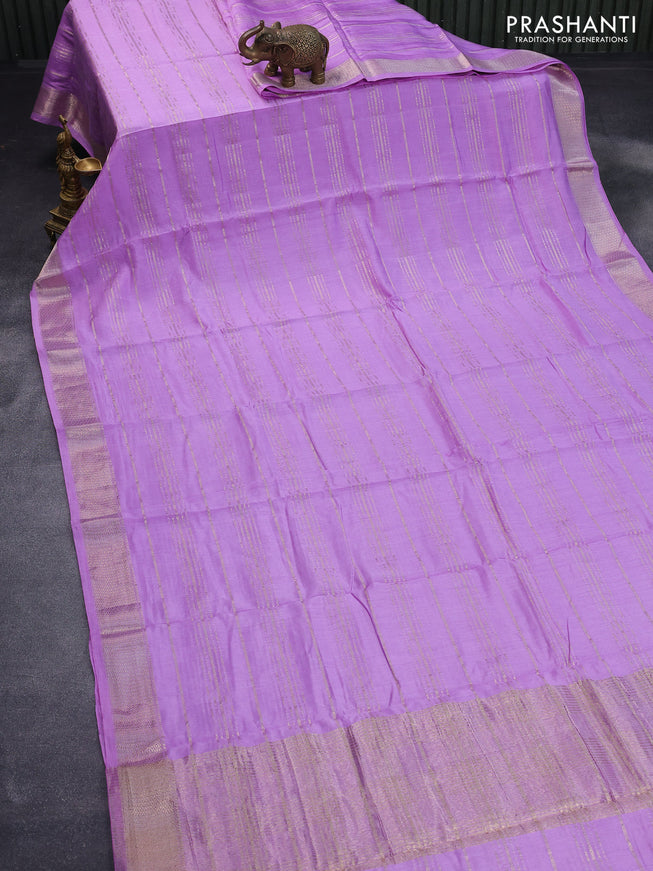 Semi chanderi saree lavender shade with allover zari weaves and zari woven border - printed blouse