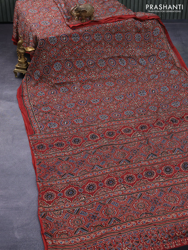 Modal silk saree maroon with allover ajrakh prints and printed border