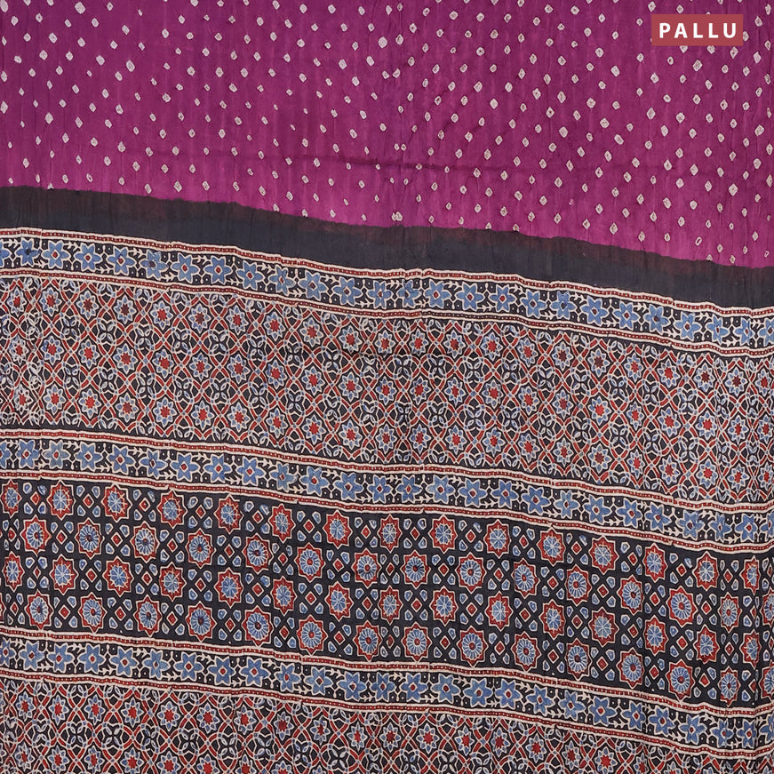 Modal silk saree purple and black with allover bandhani prints and ajrakh printed pallu