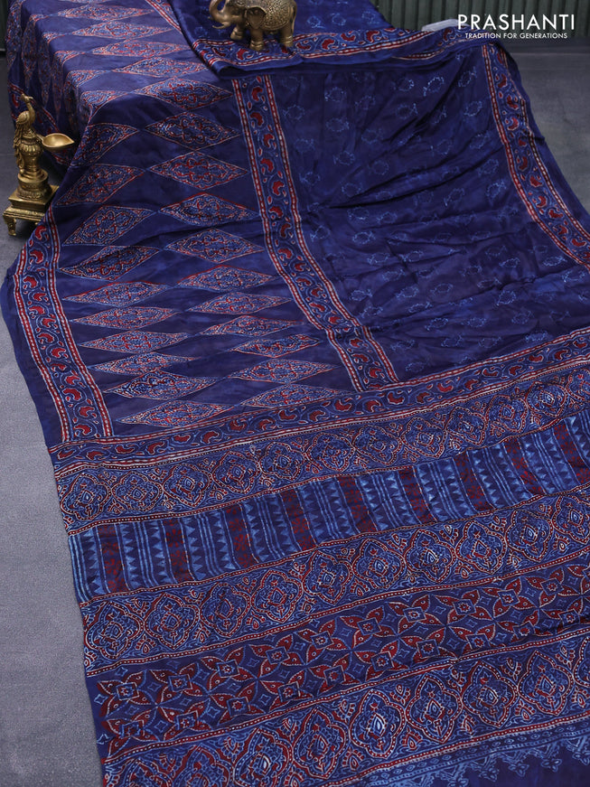 Modal silk saree blue with allover prints and ajrakh printed pallu
