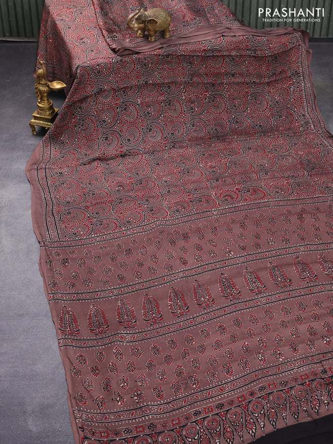 Modal silk saree brown with allover ajrakh prints and printed border
