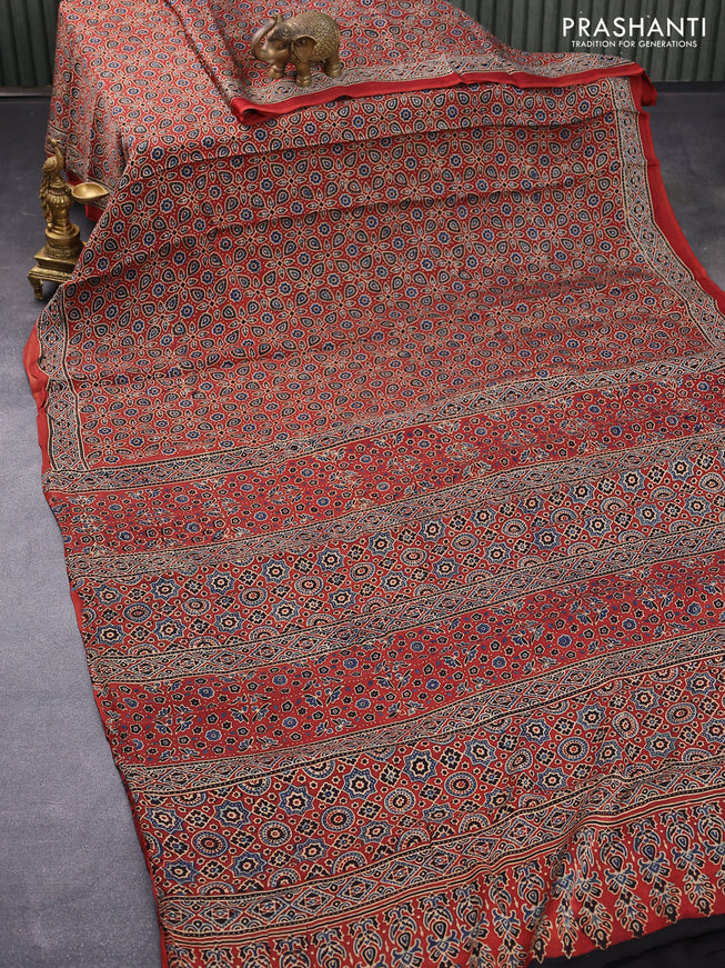 Modal silk saree maroon with allover ajrakh prints and printed border