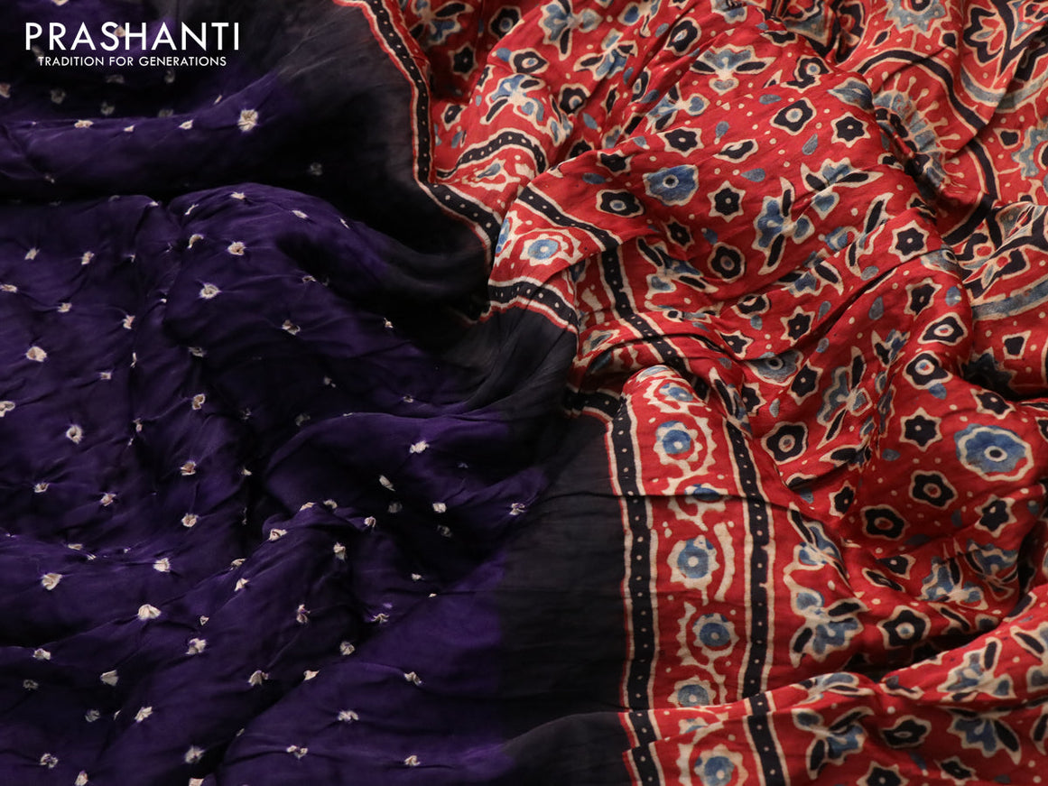 Modal silk saree deep violet and rust shade with allover bandhani prints and ajrakh printed pallu