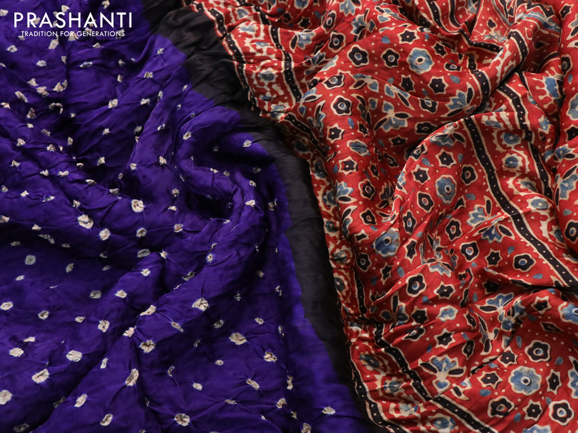 Modal silk saree violet and rust shade with allover bandhani prints and ajrakh printed pallu