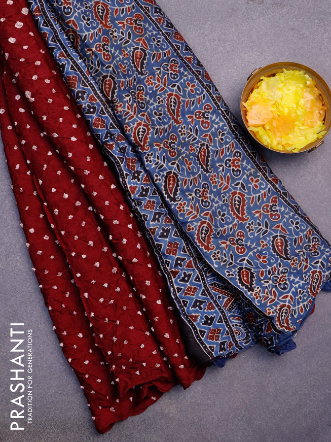 Modal silk saree deep maroon and blue with allover bandhani prints and ajrakh printed pallu