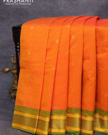 Gadwal silk cotton saree sunset orange and dual shade of green with zari woven leaf buttas and zari woven border