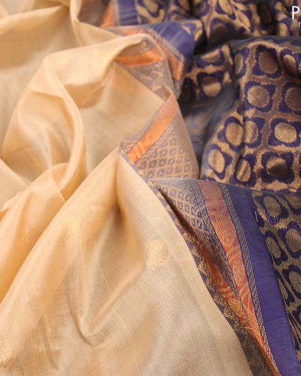 Silk cotton saree sandal and dark blue with rudhraksha zari woven buttas and zari woven korvai border
