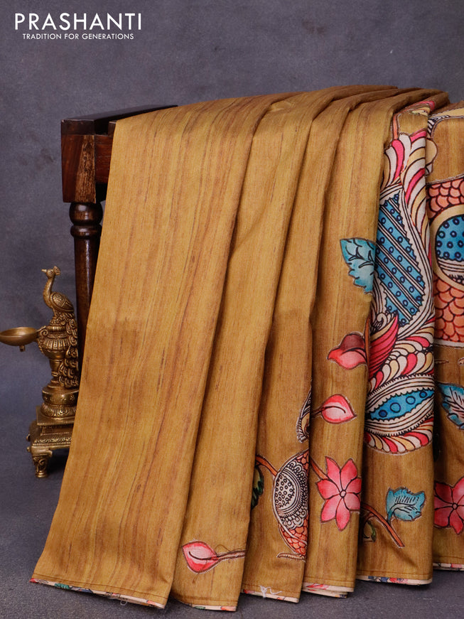Semi tussar saree mustard shade with allover kalamkari applique work in borderless style