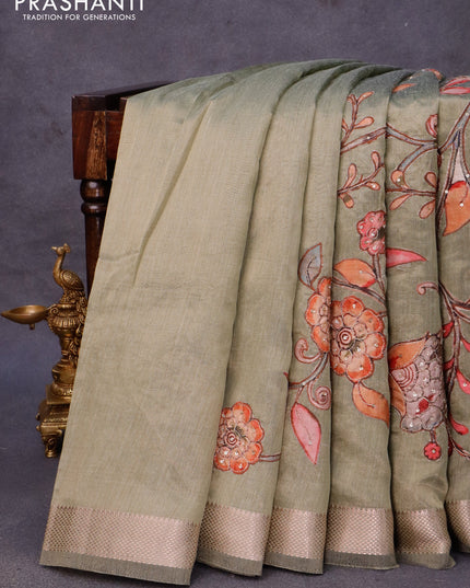 Tissue organza saree green with sequin & kalamkari applique work and zari woven border