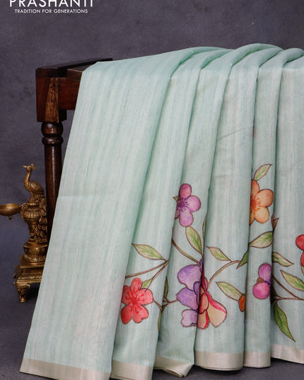 Semi tussar saree pastel green with allover floral design applique work and zari woven border