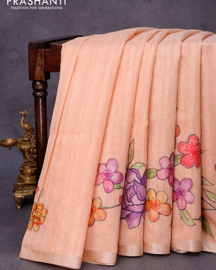 Semi tussar saree peach orange with allover floral design applique work and zari woven border