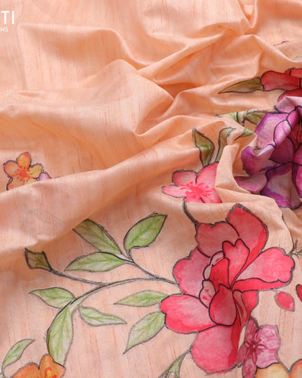 Semi tussar saree peach orange with allover floral design applique work and zari woven border