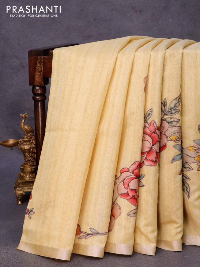 Semi tussar saree yellow with allover floral design applique work and zari woven border