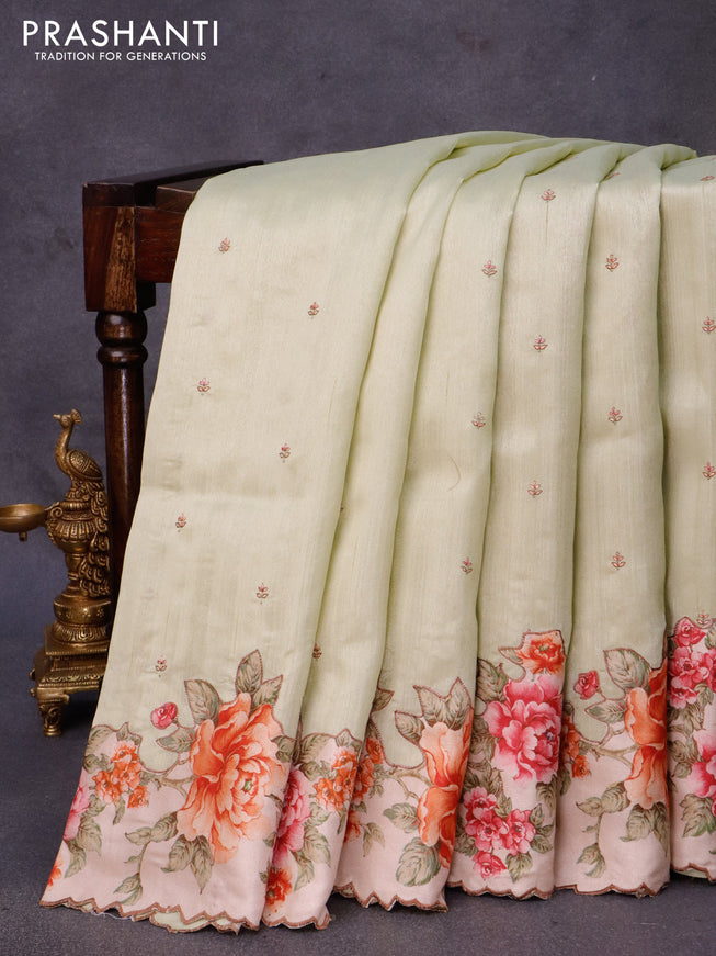 Semi tussar saree mild pista green and beige with allover embroidery work buttas and floral design applique work border