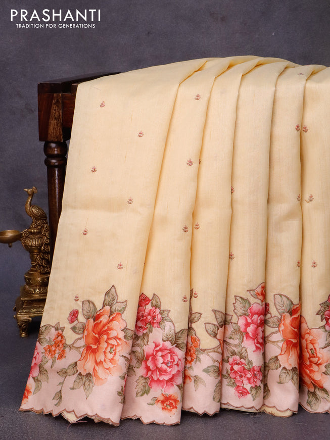 Semi tussar saree pale yellow and beige with allover embroidery work buttas and floral design applique work border