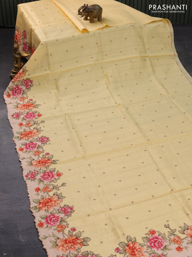 Semi tussar saree pale yellow and beige with allover embroidery work buttas and floral design applique work border