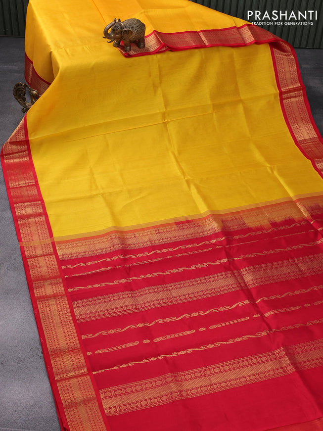 Kuppadam silk cotton saree mango yellow and red with plain body and zari woven border