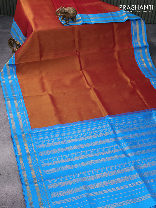 Silk cotton saree dual shade of rustic pink and cs blue with plain body and zari woven korvai border