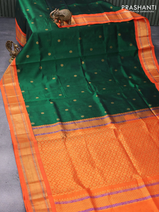 Silk cotton saree dark green and orange with rudhraksha zari woven buttas and zari woven korvai border