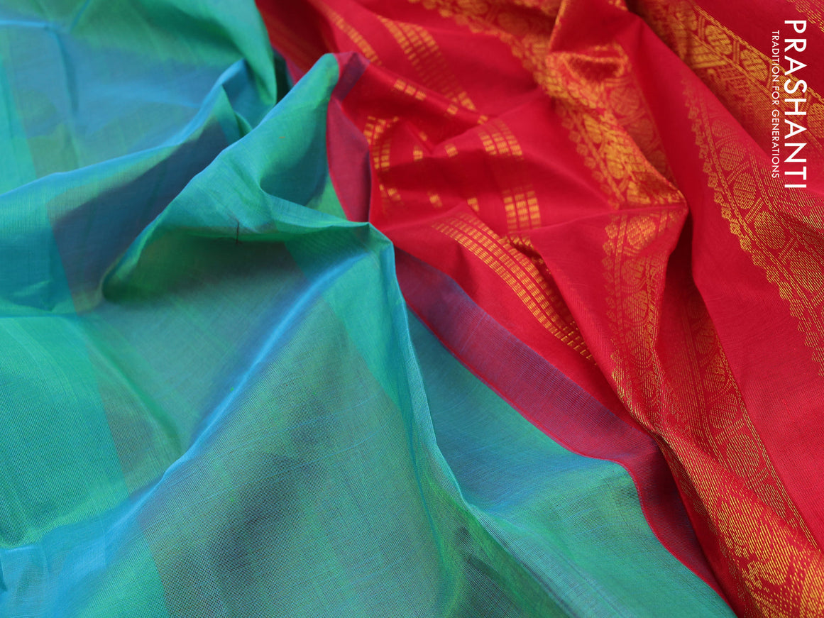 Silk cotton saree dual shade of teal bluish green and red with plain body and zari woven korvai border